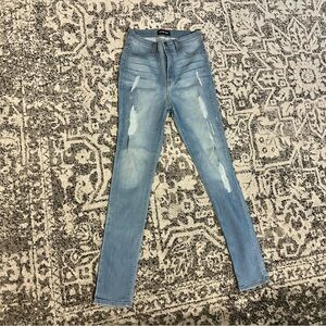 Fashion Nova distressed jeans